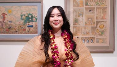 felicia chiao in front of her work